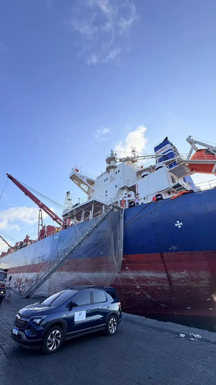 Rose Wind vehicle alongside a cargo vessel